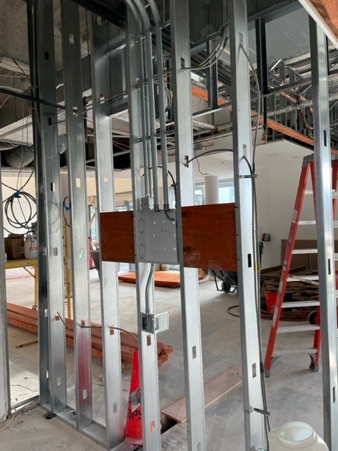 Backing and Electrical boxes goin in for Conference Room TV.jpg